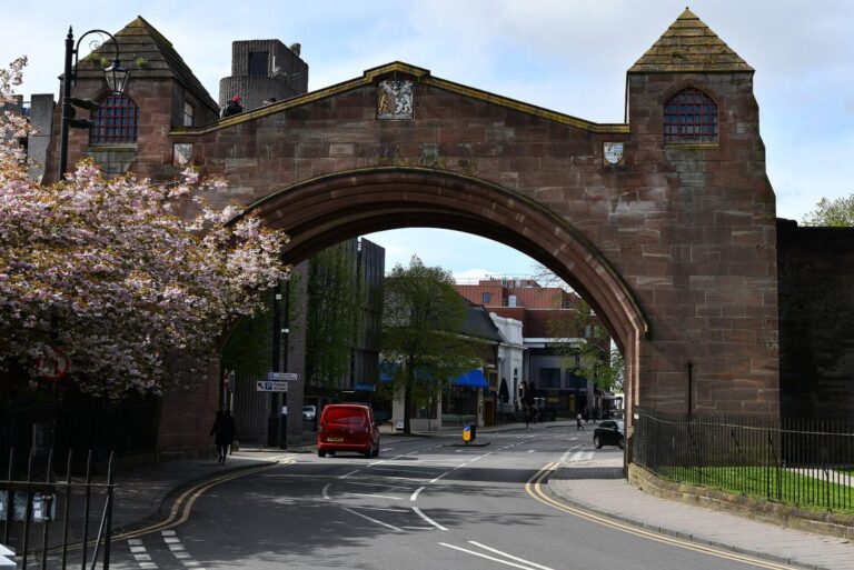 The Newgate carrying the walls walkway over Pepper Street